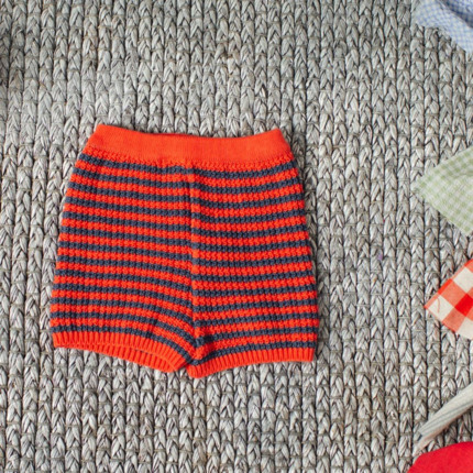 Short Coral y Marino.
